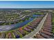 Overhead view showcasing house in desirable lakefront neighborhood at 10230 Highland Park Pl, Palmetto, FL 34221