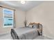 Bedroom with bed and window at 10230 Highland Park Pl, Palmetto, FL 34221