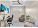 Office with desk, seating, TV and plant at 10230 Highland Park Pl, Palmetto, FL 34221