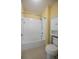 Bathroom showcasing a shower and bathtub combo with white tile surround at 10527 Falling Leaf Ct, Parrish, FL 34219