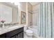 Bathroom showcasing stylish vanity, framed heron art, and bathtub, creating a relaxing space in the home at 12711 Del Corso Loop, Bradenton, FL 34211