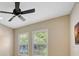 Bedroom featuring natural light, ceiling fan, and neutral colors offers a bright and airy atmosphere at 12711 Del Corso Loop, Bradenton, FL 34211