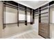 Spacious walk-in closet with custom shelving and storage, adding functionality and organization to the home at 12711 Del Corso Loop, Bradenton, FL 34211