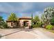 Inviting clubhouse with stone accents and lush landscaping creates an elegant first impression at 12711 Del Corso Loop, Bradenton, FL 34211