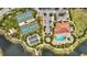 Wide aerial view of the entire recreation area with tennis courts, pool, parking, and surrounding lake at 12711 Del Corso Loop, Bradenton, FL 34211