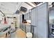 Well-organized garage featuring ample storage cabinets and workspace at 12711 Del Corso Loop, Bradenton, FL 34211