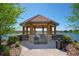 Scenic gazebo overlooking the lake, perfect for relaxation and enjoying the natural surroundings at 12711 Del Corso Loop, Bradenton, FL 34211