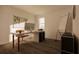 Home office with a large desk, modern computer, and ample workspace at 13040 Cedar Elm Lane, Parrish, FL 34219