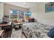 Cozy bedroom offering a bright window view, comfortable furniture, and modern decor at 1536 Leisure Dr # N4, Bradenton, FL 34207