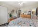 Spacious bedroom features a comfortable bed and ensuite bathroom access at 1536 Leisure Dr # N4, Bradenton, FL 34207