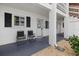 Charming front porch with seating and view of the well-maintained community at 1536 Leisure Dr # N4, Bradenton, FL 34207