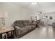 Bright living room showcasing stylish decor, natural light, and a comfortable sofa at 1536 Leisure Dr # N4, Bradenton, FL 34207