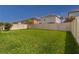 Well-maintained backyard with a privacy fence at 1570 Ludington Ave, Wesley Chapel, FL 33543