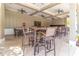 Community clubhouse with outdoor seating and ceiling fans for a relaxed atmosphere at 1570 Ludington Ave, Wesley Chapel, FL 33543