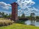 The Union Park community boasts a scenic observation tower next to a pond and walking bridge at 1570 Ludington Ave, Wesley Chapel, FL 33543