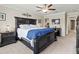 Bright main bedroom with a cozy ceiling fan and a large, inviting bed at 1570 Ludington Ave, Wesley Chapel, FL 33543
