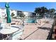 Inviting community pool area with comfortable seating and lush landscaping, perfect for relaxation and social gatherings at 1838 Sunny Dr # D35, Bradenton, FL 34207