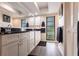 Elegant bathroom with double vanity, granite countertop, and modern fixtures at 18422 Burkholder Cir, Port Charlotte, FL 33948