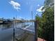 Private boat lift providing easy access to the waterfront and stunning canal views at 18422 Burkholder Cir, Port Charlotte, FL 33948