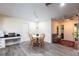 Cozy dining area with wood table set, modern floors, and built-in countertop, perfect for casual meals at 18422 Burkholder Cir, Port Charlotte, FL 33948
