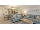 Comfortable living space adjoining the dining area and a well-equipped kitchen at 1935 Gulf Of Mexico Dr # G7-402, Longboat Key, FL 34228