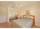 Bright bedroom with tile floors features a mirrored closet door and view to window at 2316 Bradford St, Sarasota, FL 34231