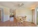 The Dining area is bright and features tile flooring, a ceiling fan, and access to the Living Room at 2316 Bradford St, Sarasota, FL 34231