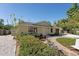 Charming home exterior with well-manicured landscaping and inviting curb appeal at 2316 Bradford St, Sarasota, FL 34231