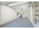 Spacious garage with ample storage space and a laundry area at 2316 Bradford St, Sarasota, FL 34231