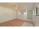 Open living area with tile flooring, neutral walls, and good light from large windows at 2316 Bradford St, Sarasota, FL 34231