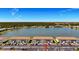 Two-story condo community near tranquil lake, community pier, and convenient parking at 25275 Rampart Blvd # 1203, Punta Gorda, FL 33983
