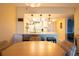 Dining area with bar seating and a view to kitchen at 25275 Rampart Blvd # 1203, Punta Gorda, FL 33983