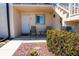 Condo entrance with chairs and small table at 25275 Rampart Blvd # 1203, Punta Gorda, FL 33983