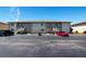 Exterior of condo building showing parking and stairways at 25275 Rampart Blvd # 1203, Punta Gorda, FL 33983