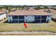 Two-story condo building with lake view and private screened lanai offers convenient outdoor living at 25275 Rampart Blvd # 1203, Punta Gorda, FL 33983