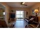 Cozy living room with a view of the lake at 25275 Rampart Blvd # 1203, Punta Gorda, FL 33983