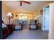 Comfortable living room with views of the kitchen area at 25275 Rampart Blvd # 1203, Punta Gorda, FL 33983