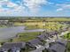 Attached villas overlooking a picturesque golf course and a scenic pond at 2912 Fiddlers Bnd, Palmetto, FL 34221