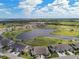 Attached villas in a golf community with views of a tranquil lake at 2912 Fiddlers Bnd, Palmetto, FL 34221