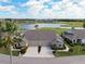 A beautiful attached villa with lush landscaping and a well-manicured lawn at 2912 Fiddlers Bnd, Palmetto, FL 34221