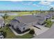Charming villa with an attached garage and well-maintained landscaping at 2912 Fiddlers Bnd, Palmetto, FL 34221