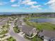 Golf course community featuring beautiful landscaping and a serene lake at 2912 Fiddlers Bnd, Palmetto, FL 34221