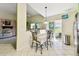 Cozy dining area showcases outdoor views, access to lanai, and connects to the kitchen and living room at 2912 Fiddlers Bnd, Palmetto, FL 34221