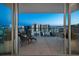 Relaxing balcony space with breathtaking city skyline views at 301 Quay Commons # 1708, Sarasota, FL 34236