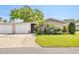 Charming single-story home showcasing a well-manicured lawn and inviting front entrance at 3328 Dartmouth Ln # 1012, Sarasota, FL 34239