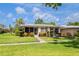 Well-maintained home with screen enclosed lanai and beautifully landscaped front yard at 3328 Dartmouth Ln # 1012, Sarasota, FL 34239
