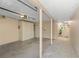 Spacious garage interior featuring ample storage, utility access, and a clean, functional design at 3328 Dartmouth Ln # 1012, Sarasota, FL 34239