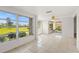 Bright and airy living room with large windows overlooking the well-maintained yard at 3328 Dartmouth Ln # 1012, Sarasota, FL 34239