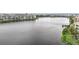 A tranquil water view from a condo overlooking the lake, enhanced by lush green surroundings at 3821 Lake Bayshore Dr # H-507, Bradenton, FL 34205