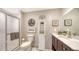 This bathroom features a sleek shower, modern vanity, and updated fixtures at 3842 Glen Oaks Manor Dr, Sarasota, FL 34232